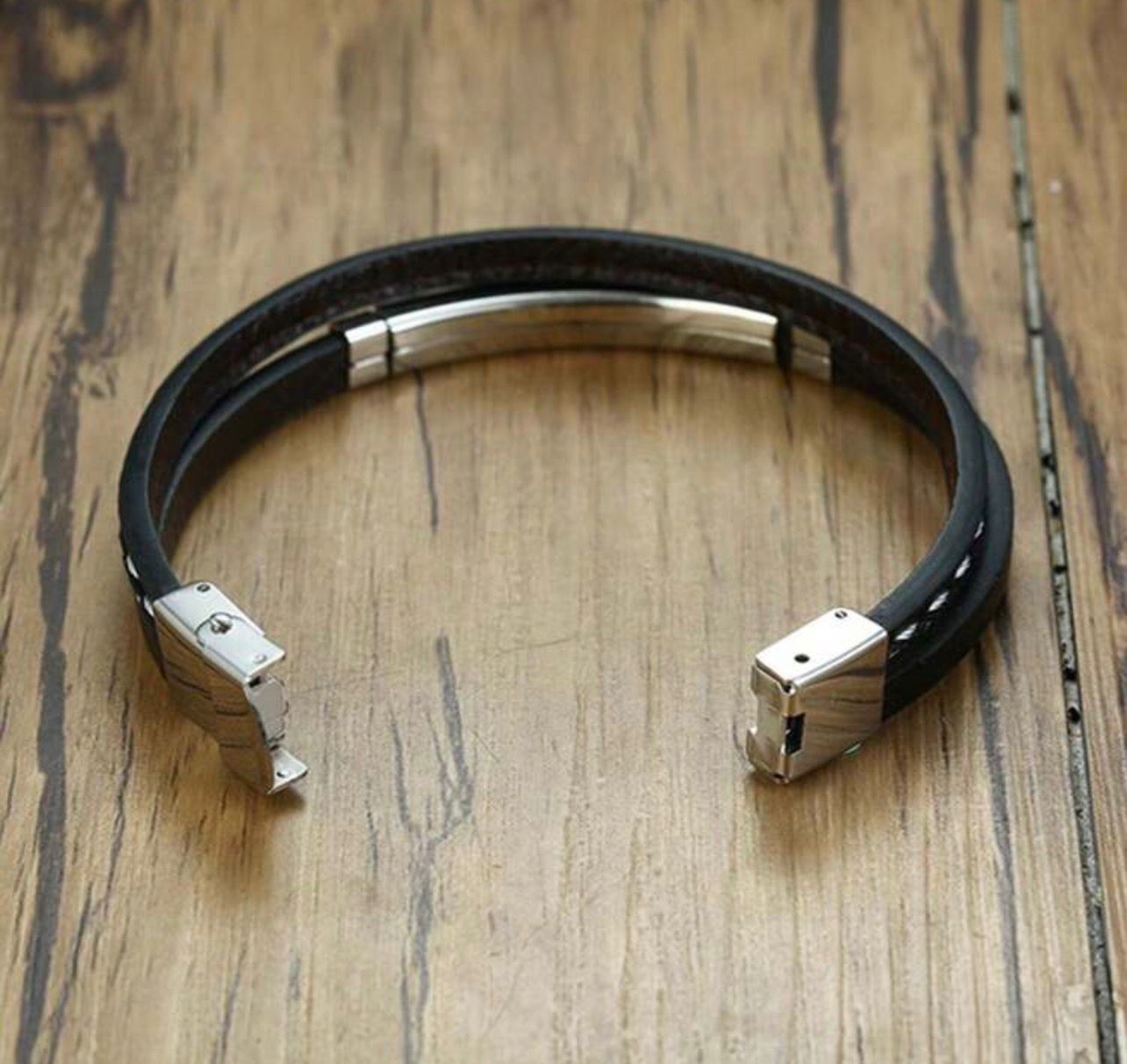 سوار رجالي جلد بو مضفور مع شريحة ستانلس ستيل – GM 280