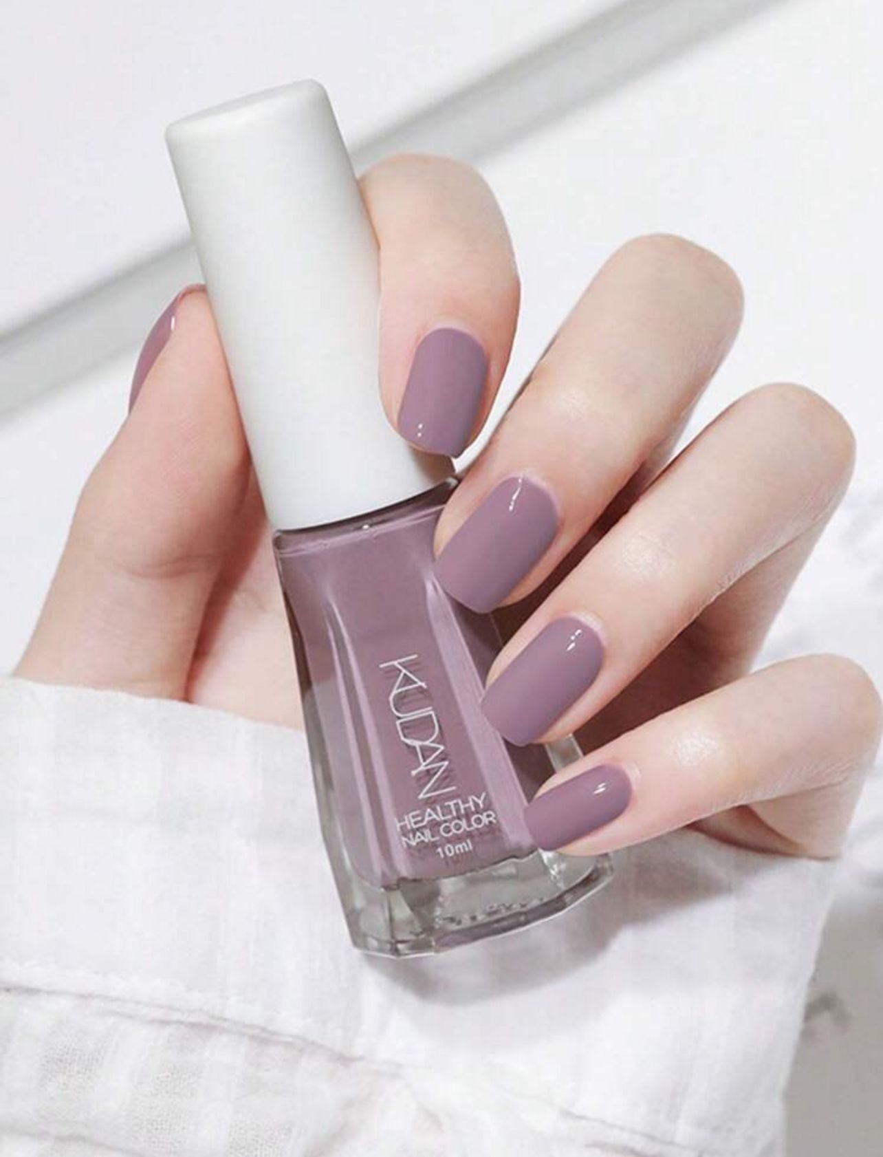 طلاء أظافر من KUDAN سهل الإزالة 25